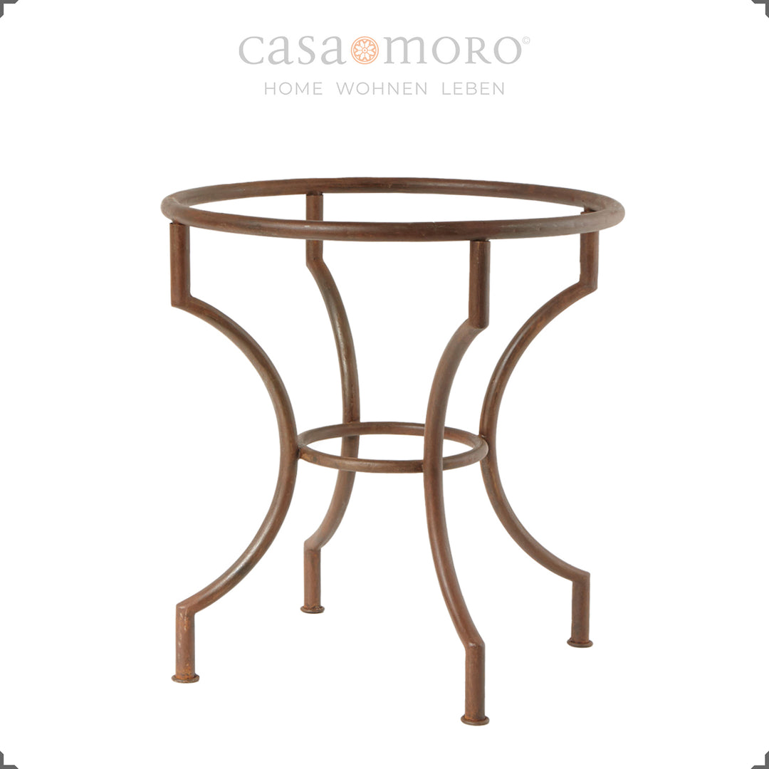 Structure de table en fer forgé de couleur rouille avec une surface laquée transparente - stable et élégante