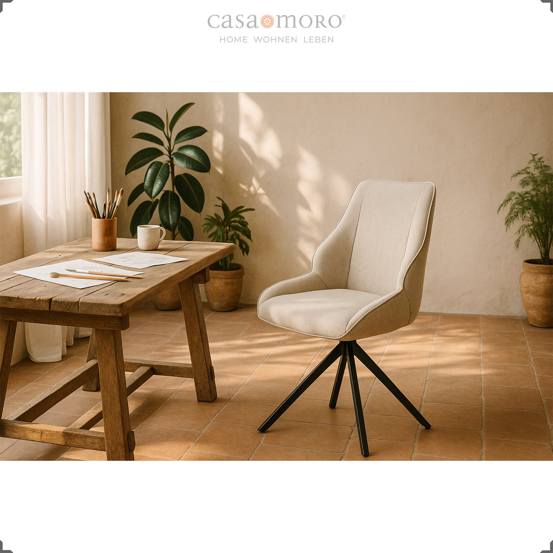360° rotating dining chair in light brown at a rustic wooden table with plants in the background, stylish interior with warm light