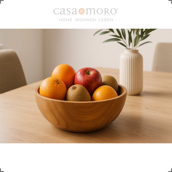 Holzschale mit Obst auf Tisch, ideal als Tischdeko